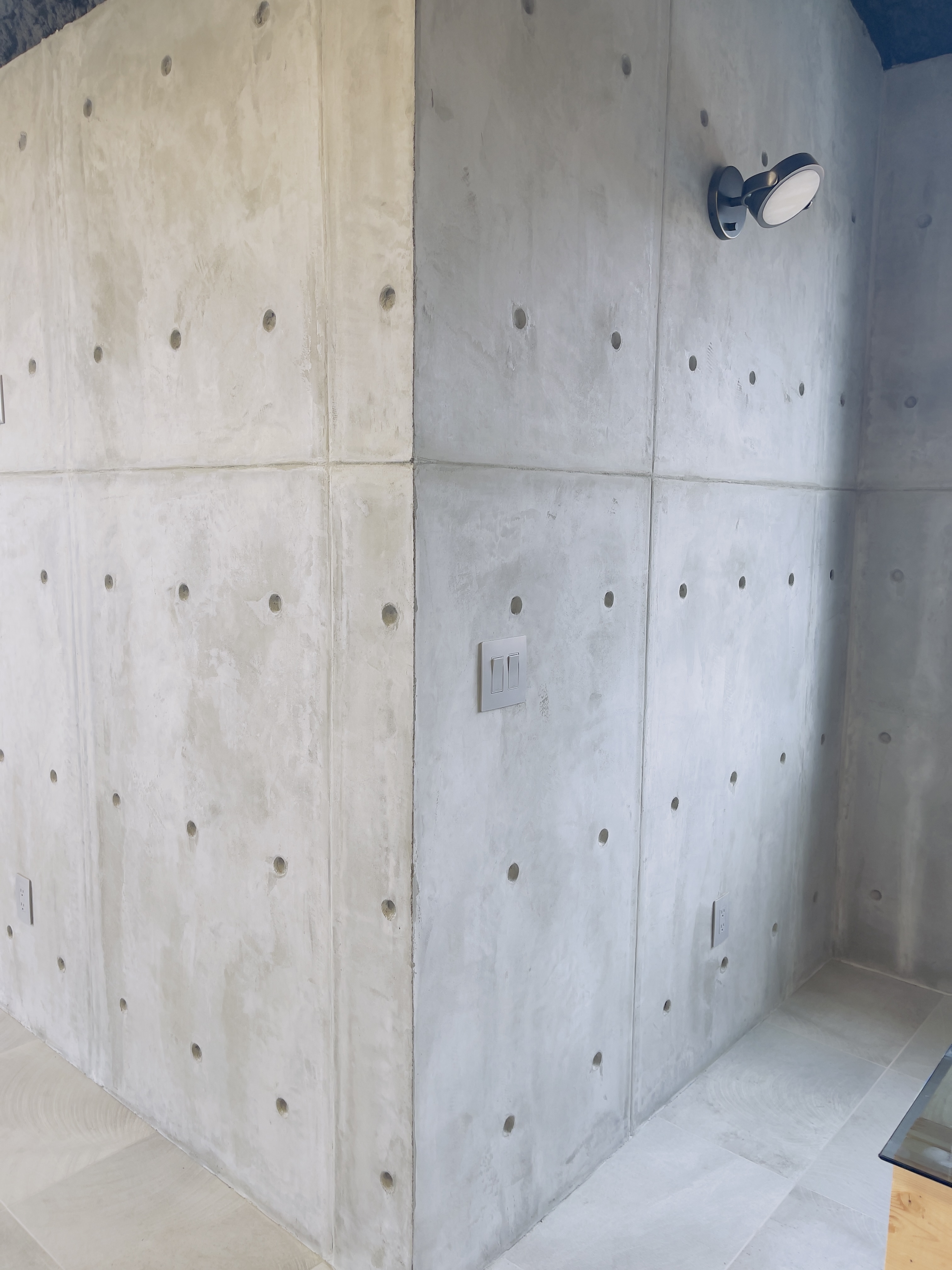 Residential precast concrete panel accent wall and Faux concrete wall look
